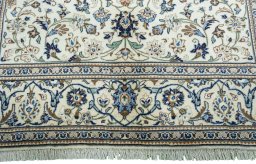 Full view of New Kashan rug from Iran / Persia, 285 × 194 cm in Beige tones