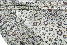 Close-up detail of 2000s Kashan rug from Iran / Persia showing Wool weave
