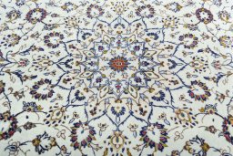 Central medallion detail of 2000s Kashan rug from Iran / Persia