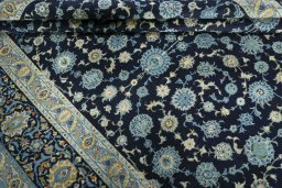 Close-up detail of 1970s Kashan rug from Iran / Persia showing Wool weave