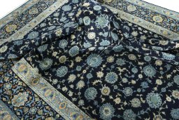 Surface texture of 1970s Kashan rug with natural Wool and intricate pattern