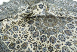 Surface texture of New Kashan rug with natural Cork and intricate pattern