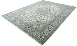 Corner detail of New Kashan rug showing border pattern and Cork pile