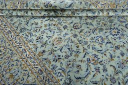 Close-up detail of 2000s Kashan rug from Iran / Persia showing Wool weave