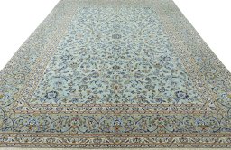 Surface texture of 2000s Kashan rug with natural Wool and intricate pattern