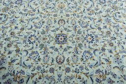 Central medallion detail of 2000s Kashan rug from Iran / Persia