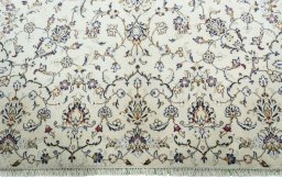 Full view of New Kashan rug from Iran / Persia, 303 × 204 cm in Beige tones