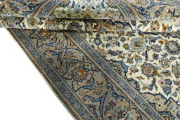 Close-up detail of 2000s Kashan rug from Iran / Persia showing Wool weave