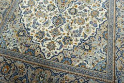 Close-up detail of 2000s Kashan rug from Iran / Persia showing Wool weave