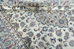 Close-up detail of 2000s Kashan rug from Iran / Persia showing Wool weave