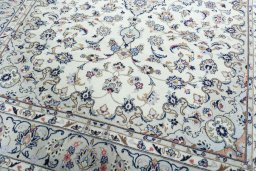 Close-up detail of 2000s Kashan rug from Iran / Persia showing Wool weave