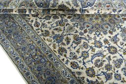 Close-up detail of 2000s Kashan rug from Iran / Persia showing Cork weave
