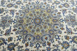 Central medallion detail of 2000s Kashan rug from Iran / Persia