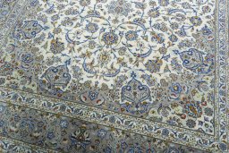 Close-up detail of 2000s Kashan rug from Iran / Persia showing Cork weave