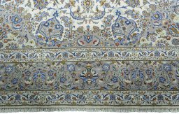 Full view of 2000s Kashan rug from Iran / Persia, 330 × 226 cm in Beige tones