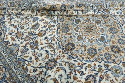 Close-up detail of 2000s Kashan rug from Iran / Persia showing Wool weave