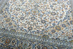 Close-up detail of 2000s Kashan rug from Iran / Persia showing Wool weave