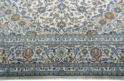 Full view of 2000s Kashan rug from Iran / Persia, 410 × 297 cm in Beige tones