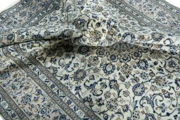 Surface texture of 2000s Kashan rug with natural Wool and intricate pattern