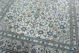 Close-up detail of 2000s Kashan rug from Iran / Persia showing Wool weave
