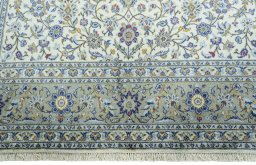 Full view of 2000s Kashan rug from Iran / Persia, 306 × 202 cm in Beige tones