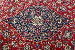 Central medallion detail of 2000s Kashan rug from Iran / Persia