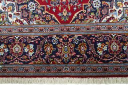 Full view of New Kashan rug from Iran / Persia, 225 × 137 cm in Red tones