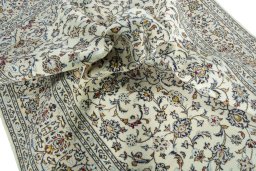 Surface texture of New Kashan rug with natural Wool and intricate pattern