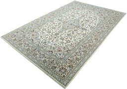 Corner detail of New Kashan rug showing border pattern and Wool pile
