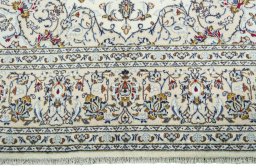 Full view of New Kashan rug from Iran / Persia, 303 × 198 cm in Beige tones