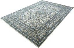 Corner detail of New Kashan rug showing border pattern and Wool pile