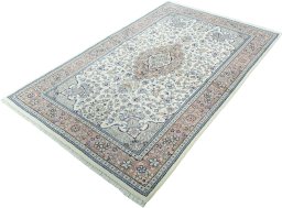 Corner detail of New Kashan rug showing border pattern and Wool pile