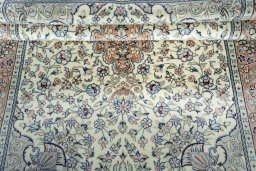 Close-up detail of New Kashan rug from Iran / Persia showing Wool weave
