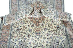 Surface texture of New Kashan rug with natural Wool and intricate pattern
