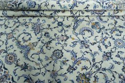 Close-up detail of 2000s Kashan rug from Iran / Persia showing Wool weave