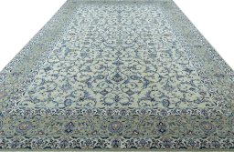 Surface texture of 2000s Kashan rug with natural Wool and intricate pattern