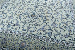 Close-up detail of 2000s Kashan rug from Iran / Persia showing Wool weave