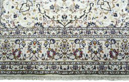 Full view of 2000s Kashan rug from Iran / Persia, 320 × 200 cm in Beige tones