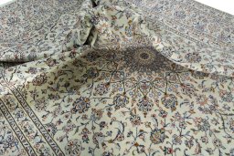 Surface texture of 2000s Kashan rug with natural Wool and intricate pattern