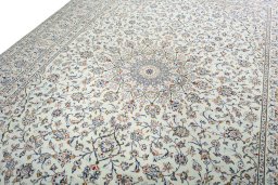 Backside of handmade 2000s Kashan rug showing knot structure and weave density