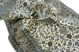 Surface texture of New Kashan rug with natural Cork and intricate pattern