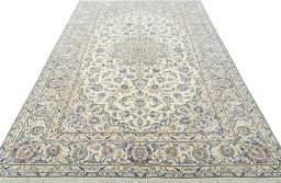 Surface texture of New Kashan rug with natural Wool and intricate pattern