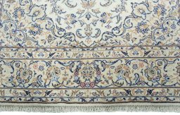 Full view of New Kashan rug from Iran / Persia, 296 × 195 cm in Beige tones