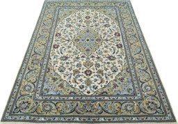 Surface texture of New Kashan rug with natural Cork and intricate pattern
