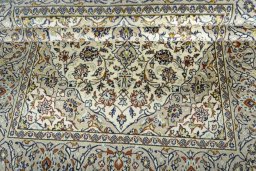 Close-up detail of 1970s Kashan rug from Iran / Persia showing Wool weave