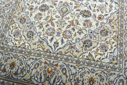 Close-up detail of 1970s Kashan rug from Iran / Persia showing Wool weave
