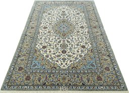 Surface texture of New Kashan rug with natural Cork and intricate pattern