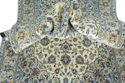 Surface texture of New Kashan rug with natural Cork and intricate pattern