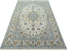 Surface texture of New Kashan rug with natural Cork and intricate pattern