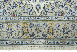 Full view of New Kashan rug from Iran / Persia, 223 × 138 cm in Beige tones